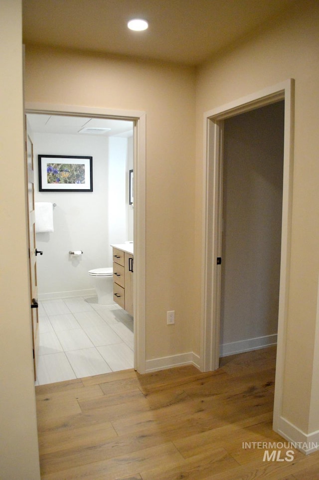 780 Village Dr Unit 308, Donnelly, ID 83615 - hallway featuring recessed lighting, baseboards, and light wood-type flooring