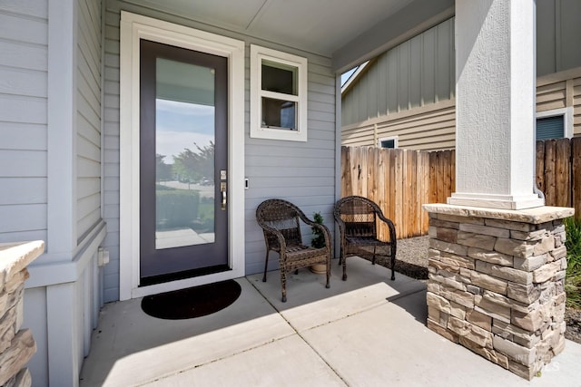property entrance featuring fence
