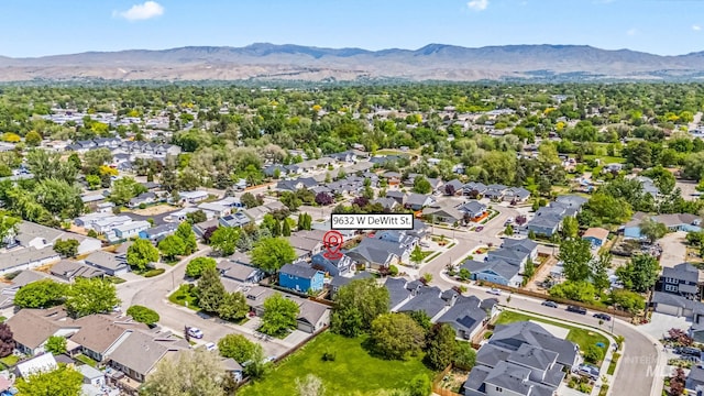 aerial perspective of suburban area featuring a mountainous background
