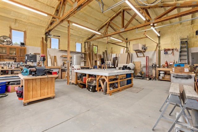 garage with a workshop area