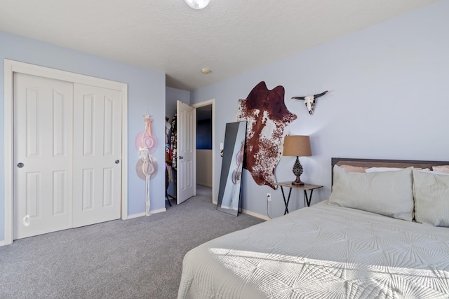 carpeted bedroom with a closet