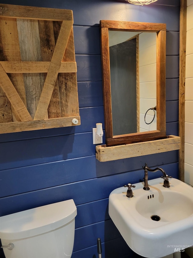 bathroom with toilet and sink