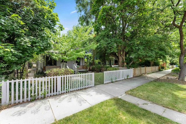 obstructed view of property with a porch