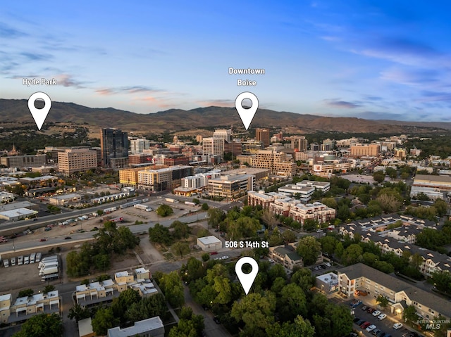 aerial view at dusk with a mountain view