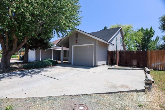 1120 SW 14th Ave, Ontario, OR 97914 - view of home's exterior with a garage and concrete driveway
