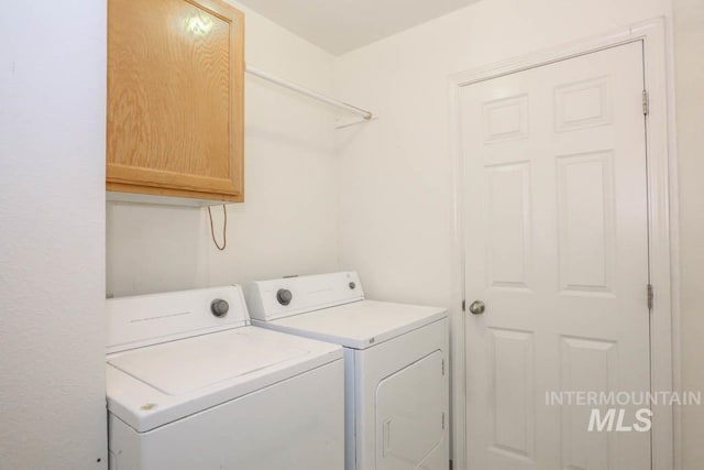 1120 SW 14th Ave, Ontario, OR 97914 - laundry room with washer and clothes dryer and cabinet space
