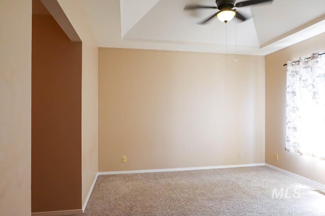1120 SW 14th Ave, Ontario, OR 97914 - spare room featuring a ceiling fan, carpet flooring, and a raised ceiling