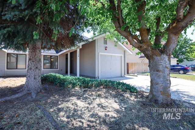 1120 SW 14th Ave, Ontario, OR 97914 - view of front of home featuring an attached garage and concrete driveway