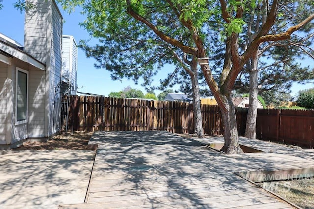 1120 SW 14th Ave, Ontario, OR 97914 - fenced backyard featuring a deck