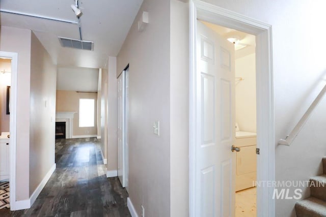 1120 SW 14th Ave, Ontario, OR 97914 - hallway featuring stairs and dark wood-style flooring