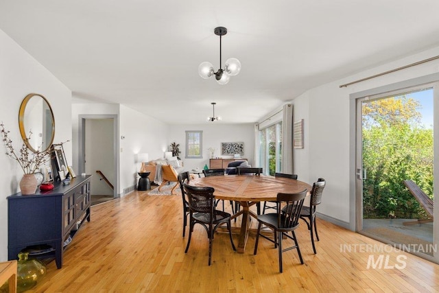 606 S Ridge Rd, Moscow, ID 83843 - dining area with light wood finished floors and a chandelier