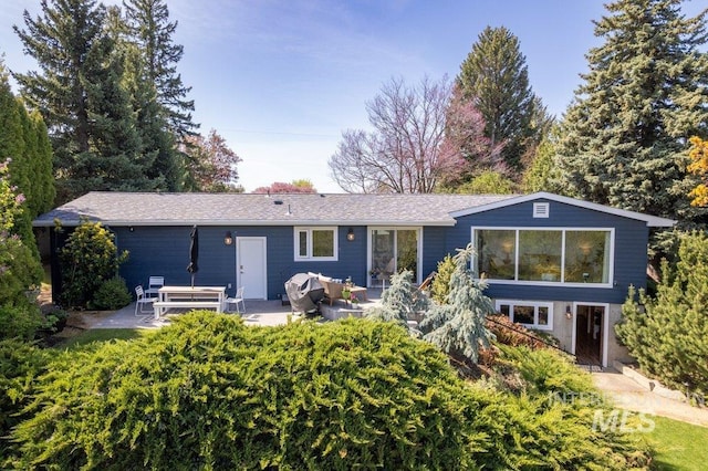 606 S Ridge Rd, Moscow, ID 83843 - back of property featuring a patio and outdoor lounge area