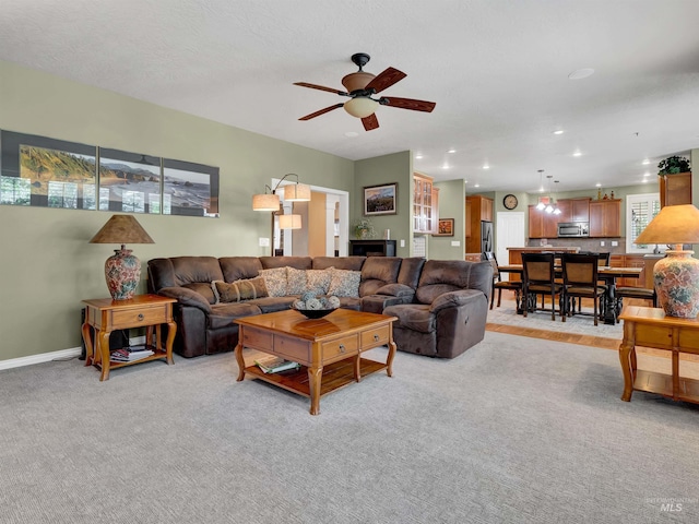 1546 N Dragonfly Ct, Eagle, ID 83616 - living area featuring recessed lighting, ceiling fan, light carpet, and baseboards