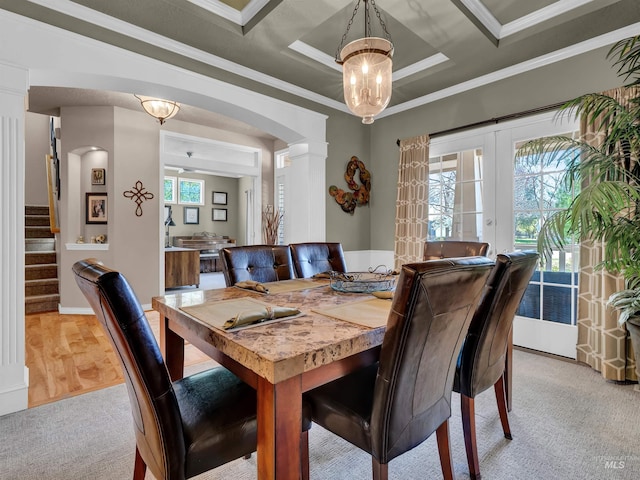 1546 N Dragonfly Ct, Eagle, ID 83616 - dining room featuring ornate columns, arched walkways, crown molding, and light colored carpet