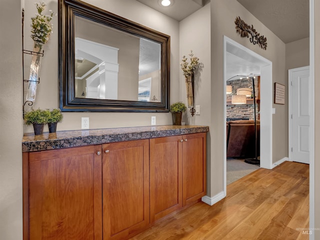 1546 N Dragonfly Ct, Eagle, ID 83616 - interior space with wood finished floors, vanity, and baseboards