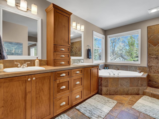 1546 N Dragonfly Ct, Eagle, ID 83616 - full bathroom featuring a bath, double vanity, a sink, and stone finish flooring