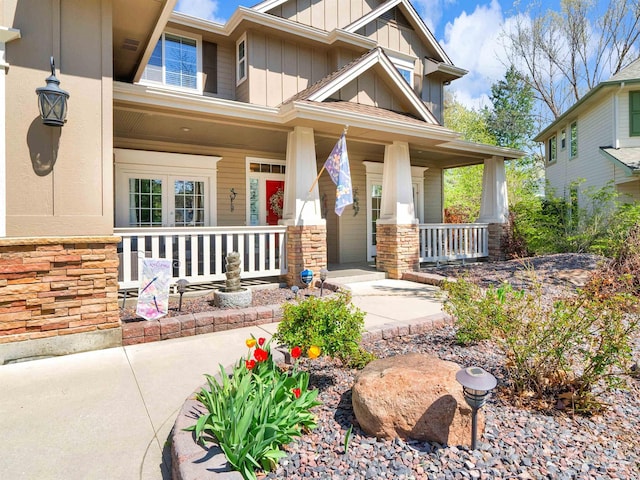 1546 N Dragonfly Ct, Eagle, ID 83616 - craftsman house with board and batten siding and a porch