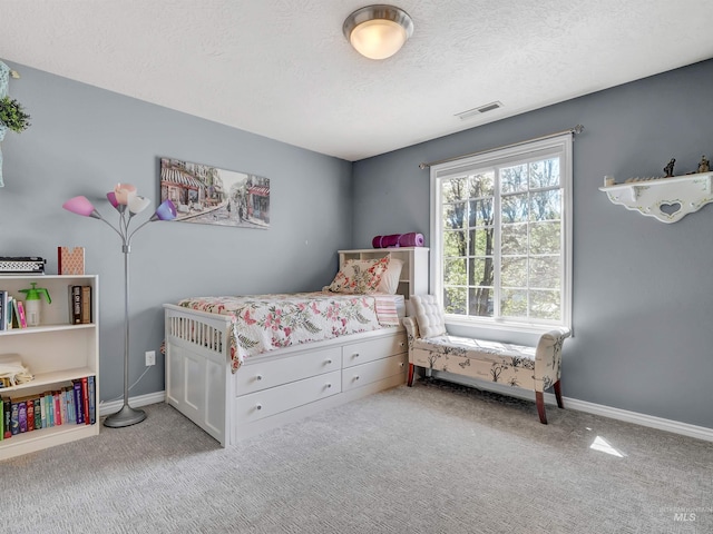 1546 N Dragonfly Ct, Eagle, ID 83616 - bedroom with baseboards, visible vents, a textured ceiling, and carpet flooring