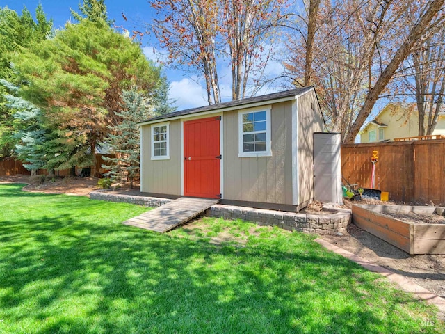 1546 N Dragonfly Ct, Eagle, ID 83616 - view of shed with fence and a vegetable garden