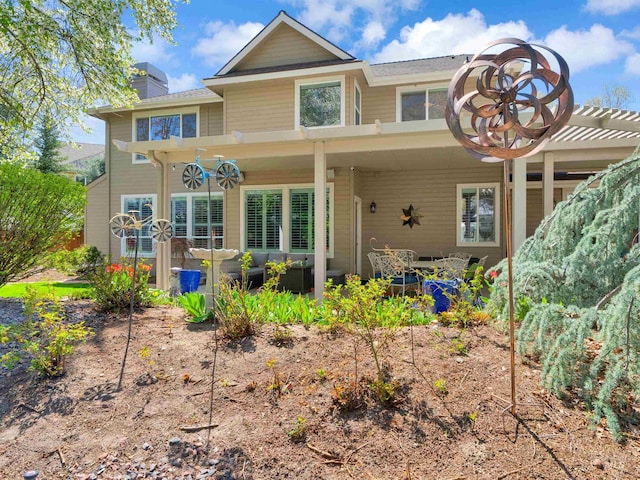 1546 N Dragonfly Ct, Eagle, ID 83616 - rear view of property with a chimney and an outdoor living space