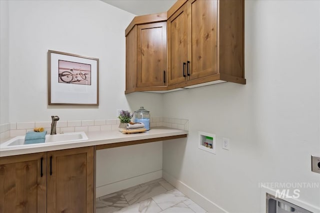 11270 S Saylis Way, Kuna, ID 83634 - laundry area featuring cabinet space, electric dryer hookup, hookup for a washing machine, and light marble finish floors