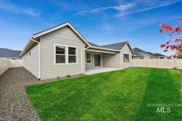 11270 S Saylis Way, Kuna, ID 83634 - rear view of property featuring a patio area and a fenced backyard