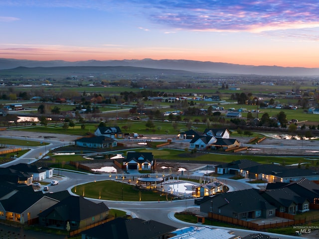 11270 S Saylis Way, Kuna, ID 83634 - aerial view of residential area featuring a mountainous background