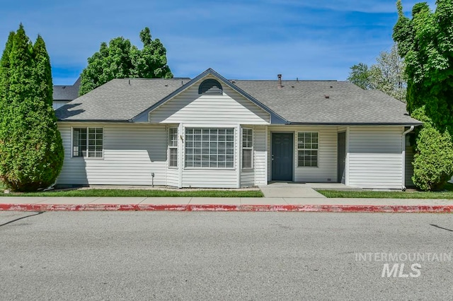 single story home featuring a garage