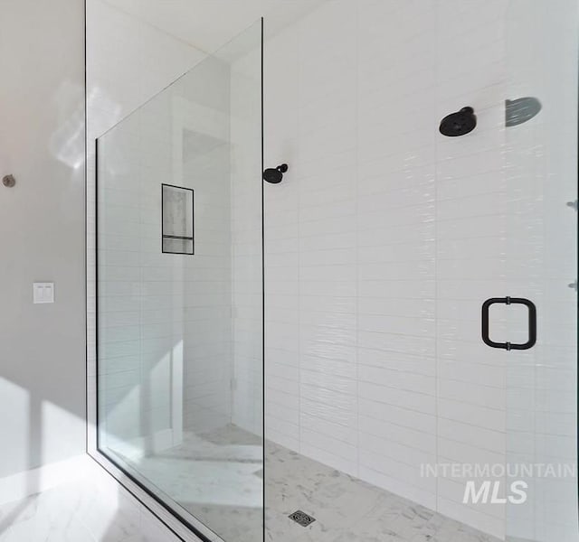 bathroom with a stall shower