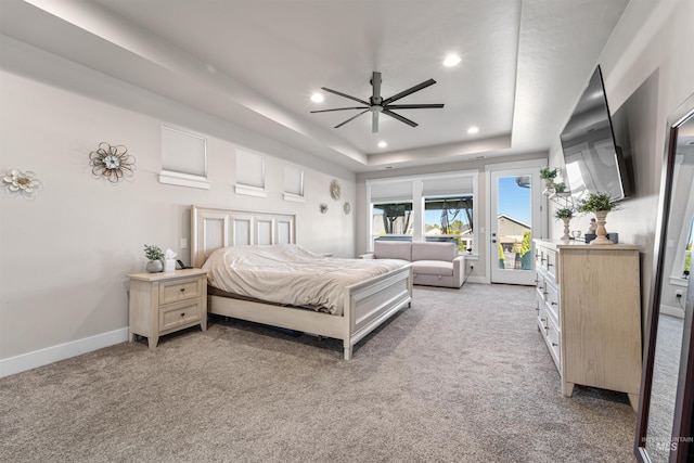 3056 E Columbus River Ct, Nampa, ID 83686 - bedroom featuring access to outside, recessed lighting, a raised ceiling, and light colored carpet