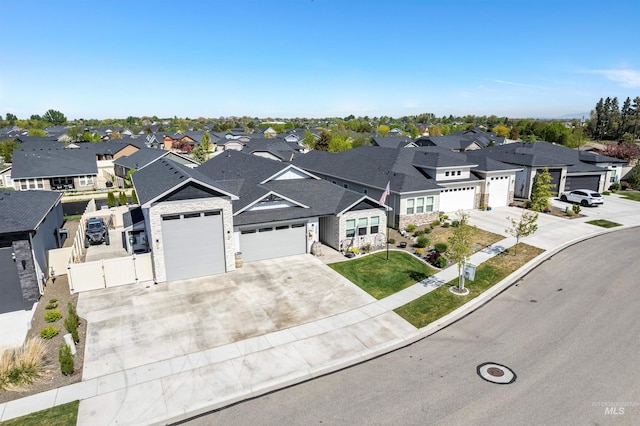 3056 E Columbus River Ct, Nampa, ID 83686 - view of front facade featuring a garage, a gate, a residential view, and concrete driveway