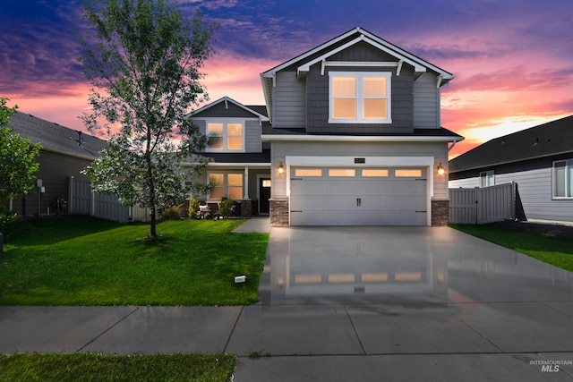 view of front of property featuring a lawn, central air condition unit, and a garage