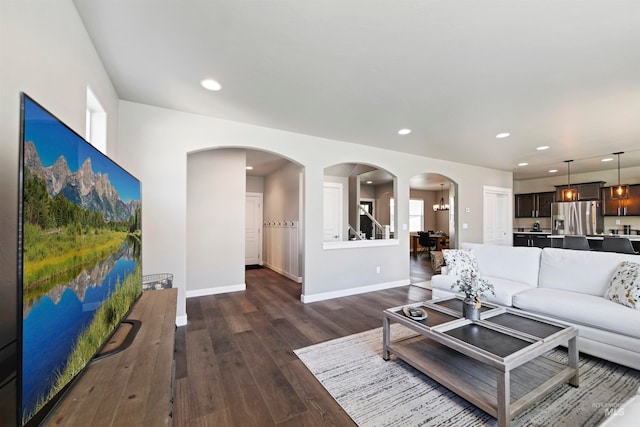 living room with dark wood-type flooring