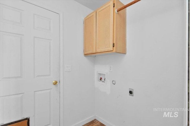 2702 N Camden Pl, Boise, ID 83704 - laundry area featuring wood finished floors, hookup for a washing machine, hookup for an electric dryer, cabinet space, and baseboards