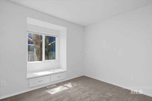 2702 N Camden Pl, Boise, ID 83704 - carpeted empty room featuring baseboards and visible vents