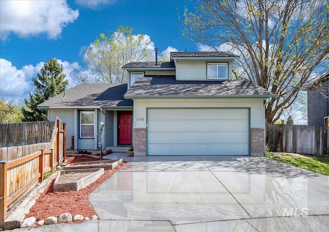 2702 N Camden Pl, Boise, ID 83704 - view of front of property with fence, brick siding, a garage, and concrete driveway