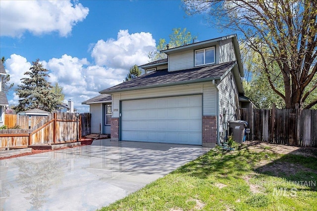 2702 N Camden Pl, Boise, ID 83704 - traditional home featuring brick siding, concrete driveway, and fence
