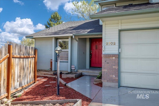 2702 N Camden Pl, Boise, ID 83704 - entrance to property with fence and a shingled roof