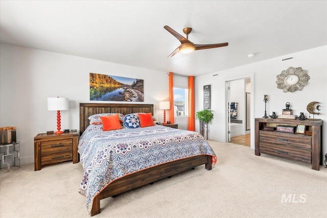 11211 Sopris Loop, Caldwell, ID 83605 - carpeted bedroom featuring a ceiling fan