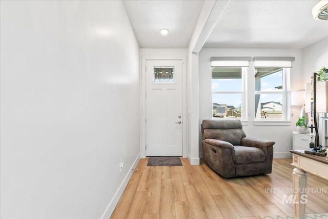 11211 Sopris Loop, Caldwell, ID 83605 - foyer entrance featuring light wood finished floors and baseboards