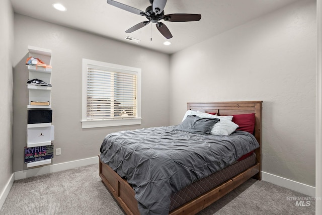 bedroom with carpet floors, visible vents, baseboards, and recessed lighting