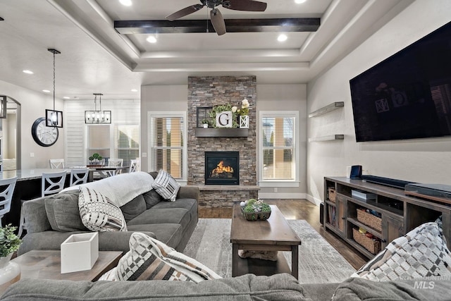 living area with ceiling fan, a fireplace, wood finished floors, and recessed lighting