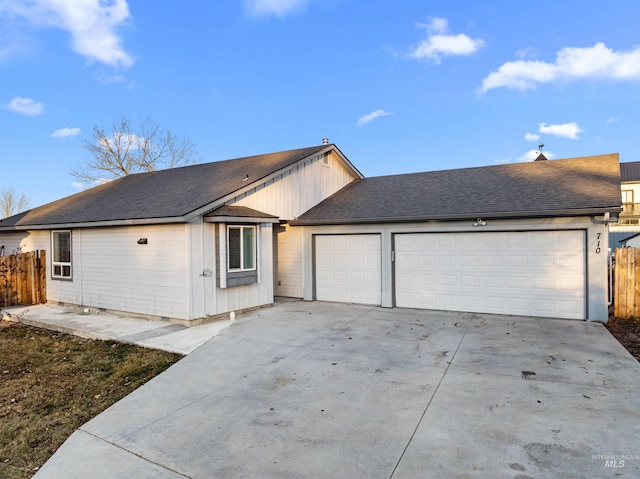 ranch-style house featuring a garage