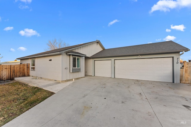 ranch-style house featuring a garage