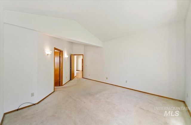 900 N Player Ave, Eagle, ID 83616 - unfurnished room with light carpet, lofted ceiling, and baseboards