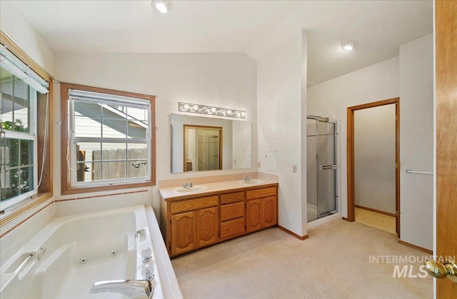 900 N Player Ave, Eagle, ID 83616 - bathroom with lofted ceiling, a shower stall, a jetted tub, and double vanity