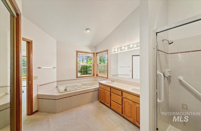 900 N Player Ave, Eagle, ID 83616 - full bathroom featuring vaulted ceiling, a stall shower, a tub with jets, and double vanity