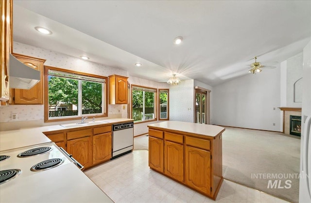 900 N Player Ave, Eagle, ID 83616 - kitchen featuring dishwasher, extractor fan, a sink, light countertops, and a kitchen island
