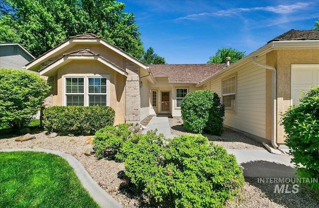 900 N Player Ave, Eagle, ID 83616 - doorway to property with stucco siding
