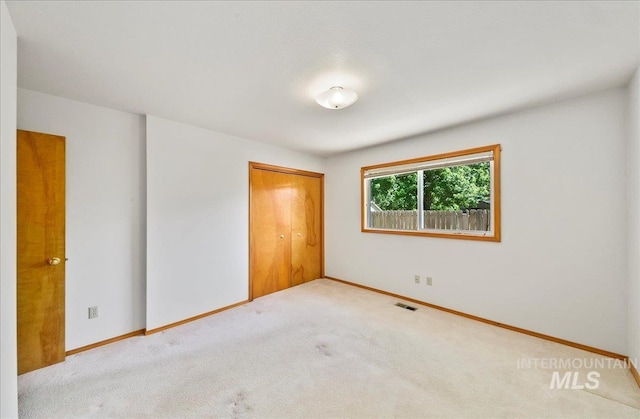 900 N Player Ave, Eagle, ID 83616 - unfurnished bedroom with carpet floors, baseboards, and a closet